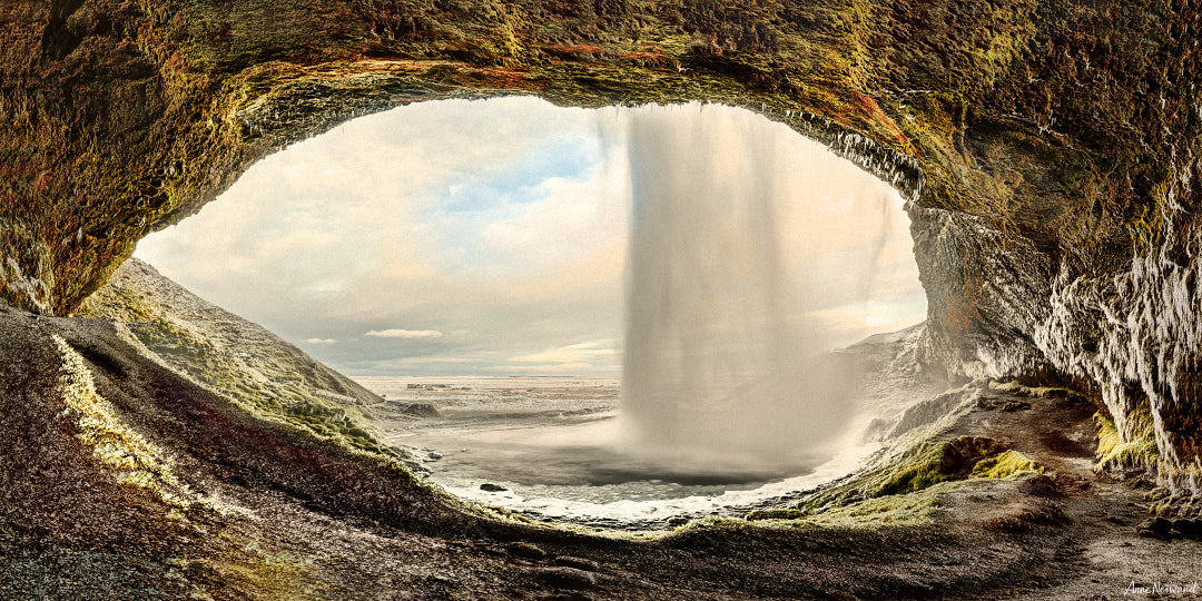 View from behind Seljalandsfoss waterfall in Iceland