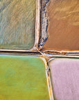 square aerial photo of salt ponds