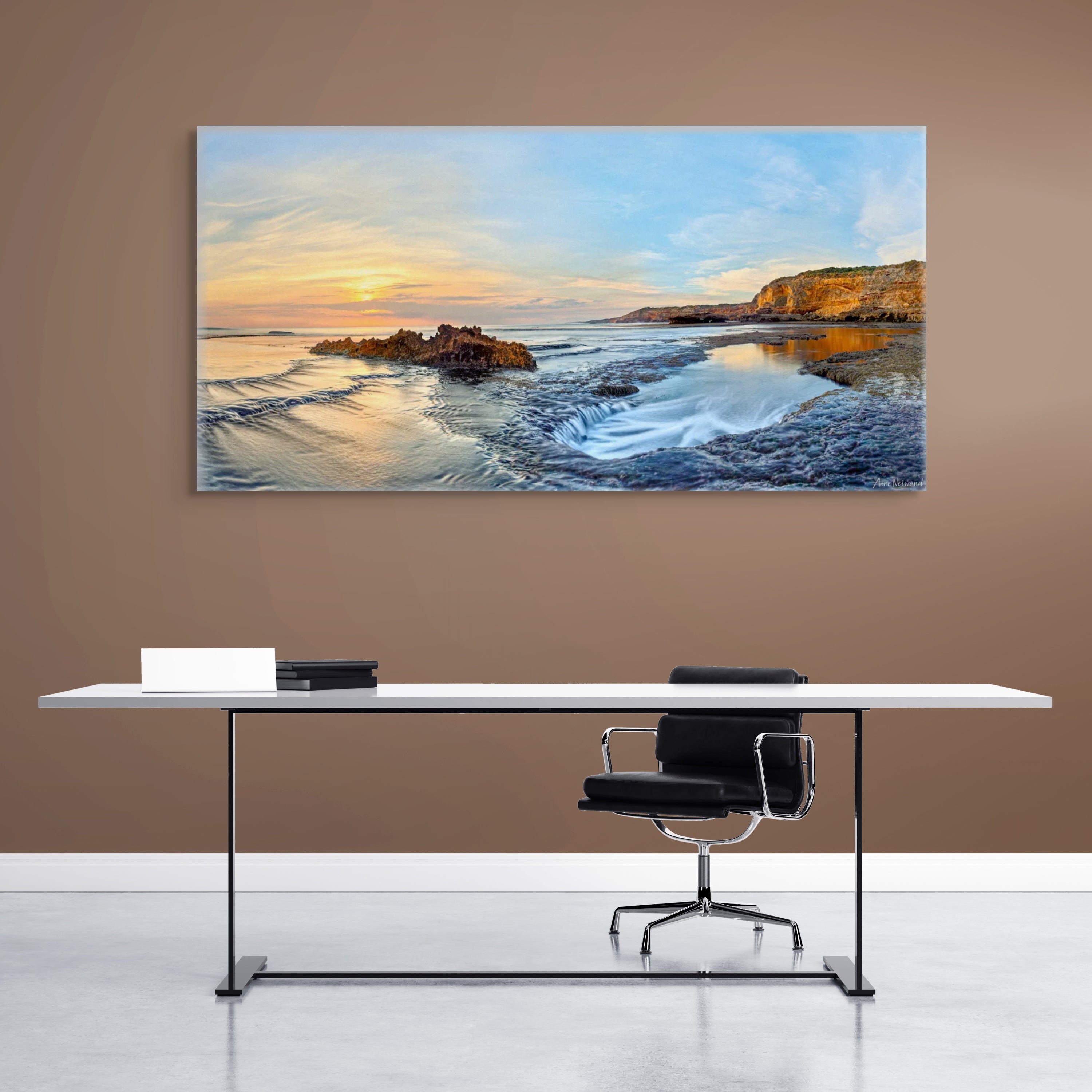 Fine art photo of coastal sunrise with tidal waterfall and golden cliffs