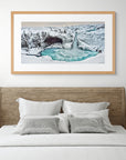 Snow-covered cliffs and icy plunge pool