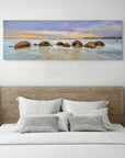 Sunset seascape with boulders