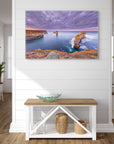 Fine art seascape of rock formations and soft morning light over calm ocean