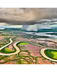 River reflections in floodwaters under dramatic sky