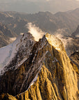 Crisp white snow and deep shadows on Denali National Park's iconic peaks, Alaska wilderness aerial photo