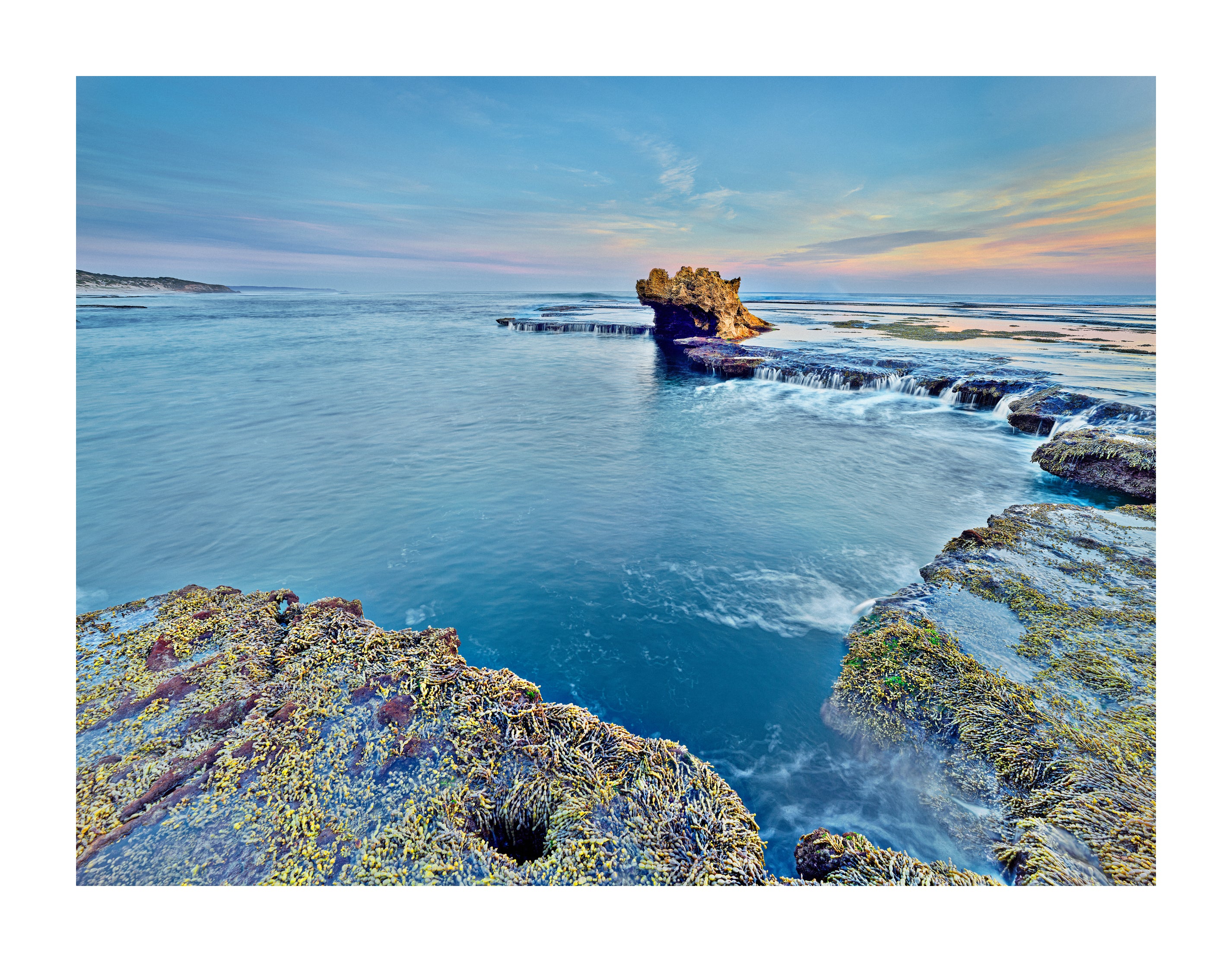 dramatic ocean rock formation artwork