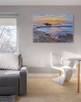 Sunset seascape showing flowing water and layered reef textures