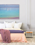 Dreamy aerial seascape with layered colors and subtle ripples