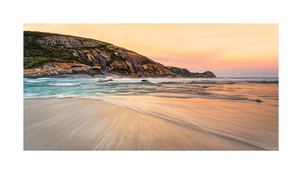 serene coast with flowing water image